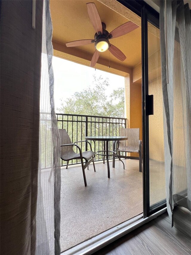 balcony featuring ceiling fan