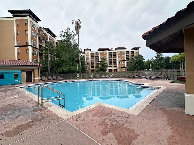 view of swimming pool featuring a patio