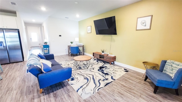 living room featuring hardwood / wood-style floors