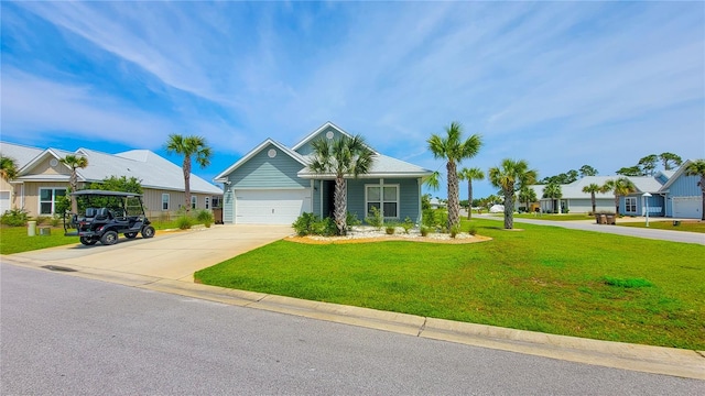 view of front of property featuring a garage and a front yard