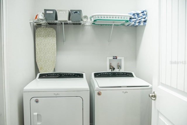 laundry room featuring hookup for a washing machine and independent washer and dryer