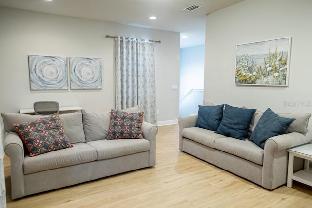 living room featuring light wood-type flooring