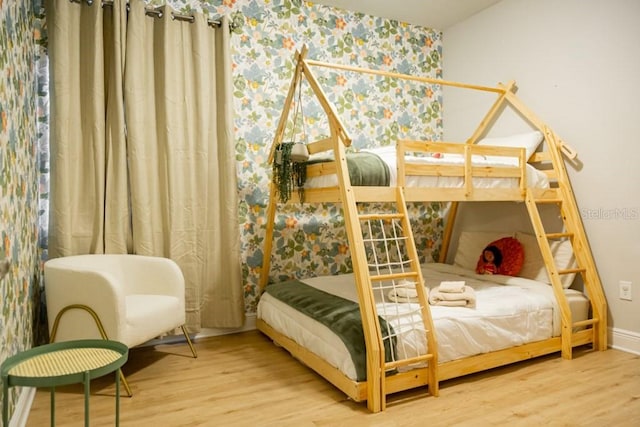 bedroom featuring hardwood / wood-style floors