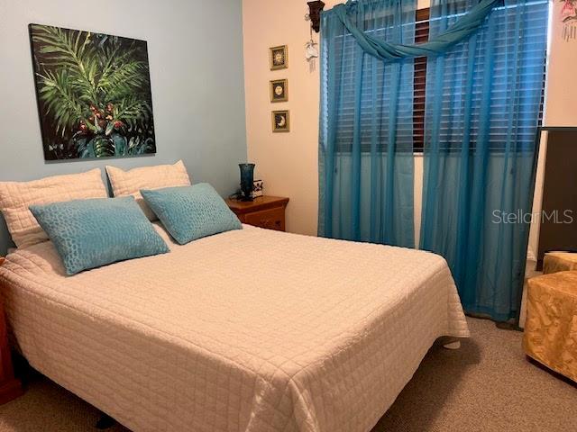 7313 Cabor Ct, Orlando, FL 32818 - bedroom featuring carpet