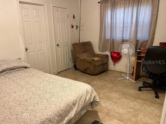 view of tiled bedroom