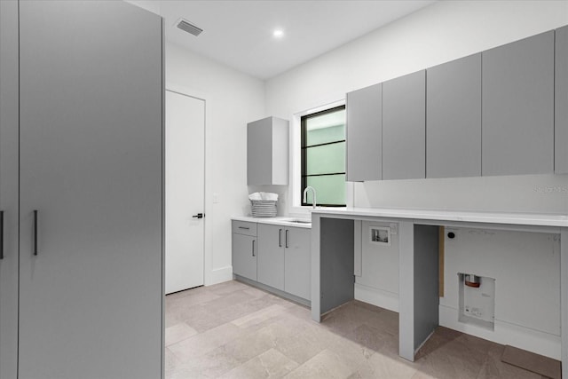 interior space with tile flooring and vanity