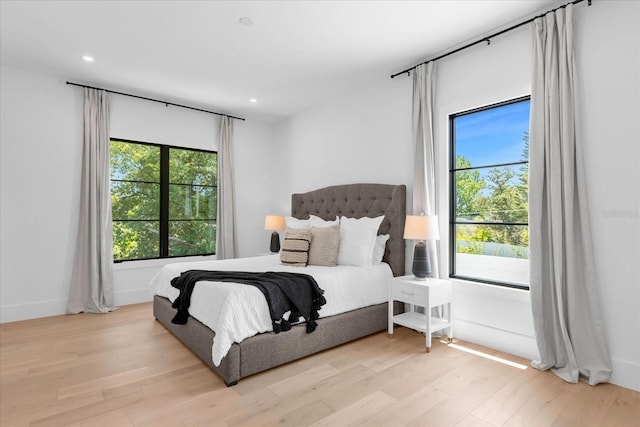 bedroom featuring light hardwood / wood-style floors