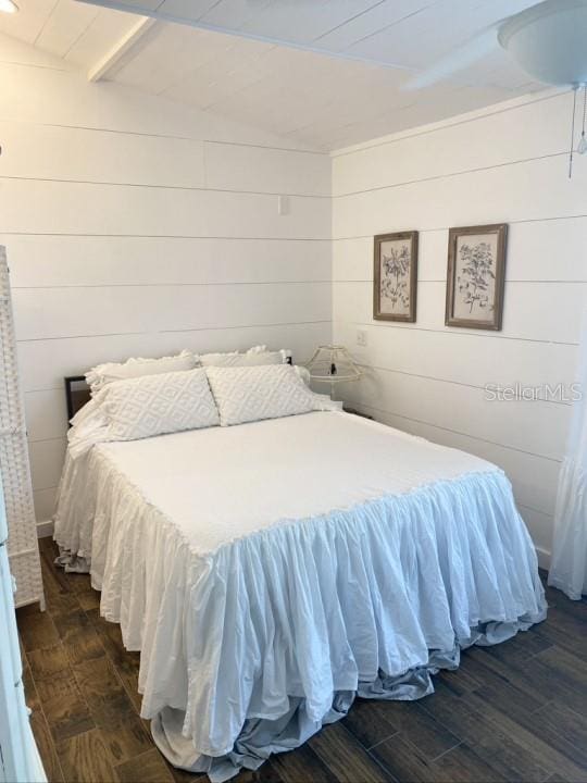 bedroom featuring dark hardwood / wood-style floors