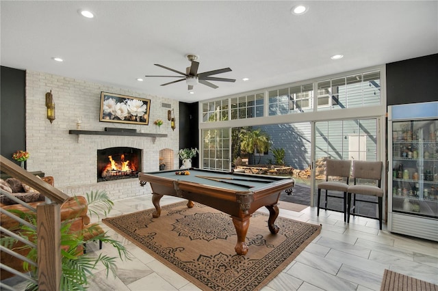 rec room with recessed lighting, a ceiling fan, pool table, and a fireplace