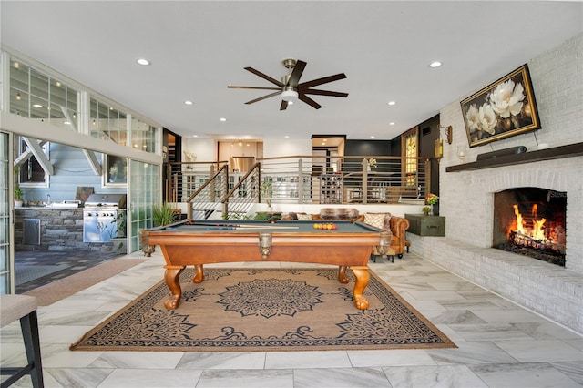 game room with recessed lighting, pool table, ceiling fan, and a fireplace