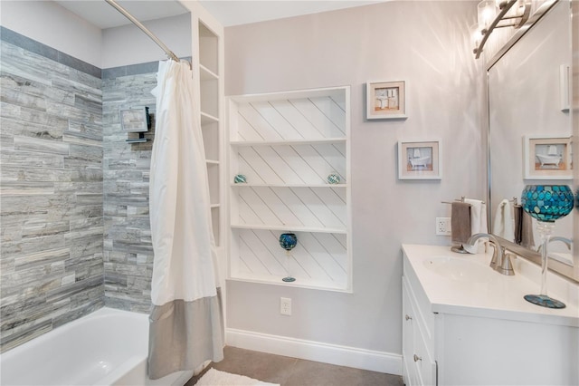 bathroom featuring tile patterned floors, vanity, baseboards, and shower / bathtub combination with curtain