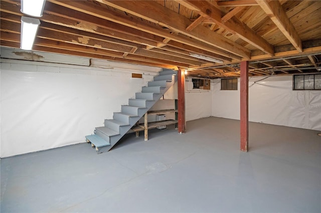 unfinished basement with stairs