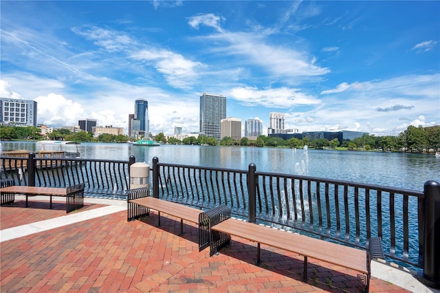 dock area with a water view and a city view