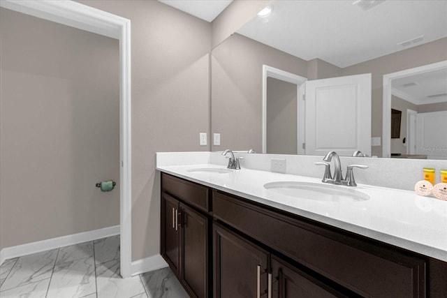 bathroom with tile patterned floors and vanity