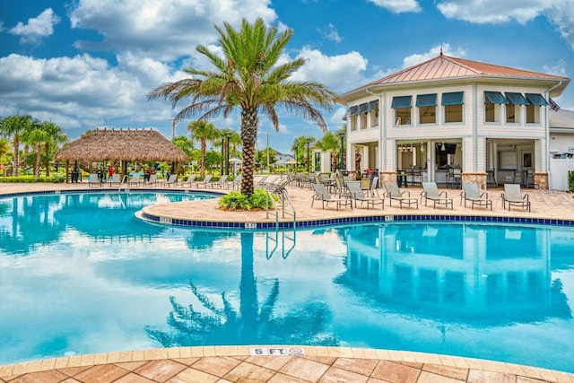 view of swimming pool featuring a patio