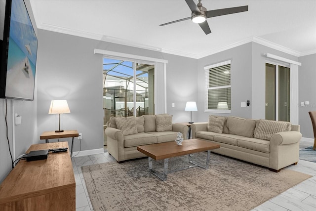 living room featuring crown molding and ceiling fan