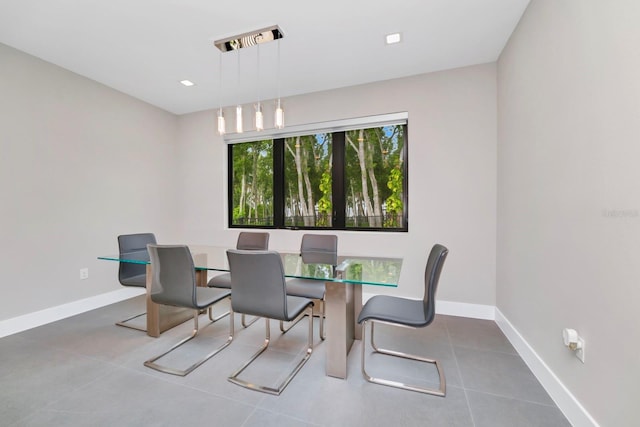 dining area featuring tile flooring