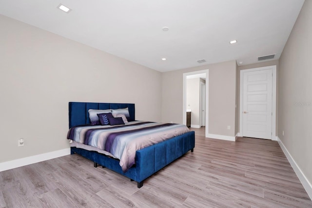 bedroom featuring wood-type flooring