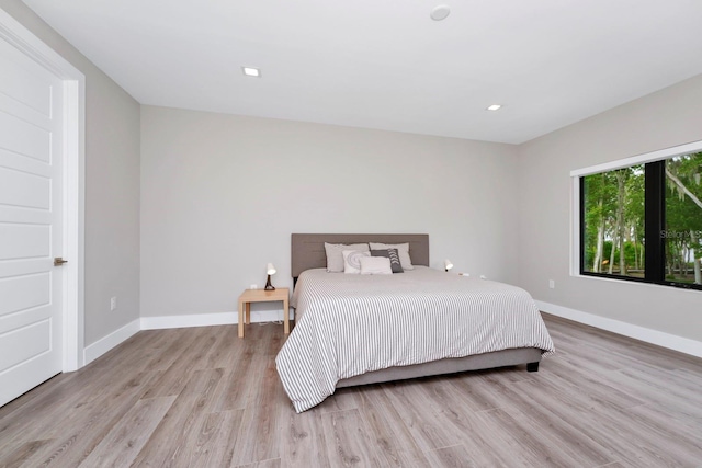 bedroom featuring light hardwood / wood-style floors