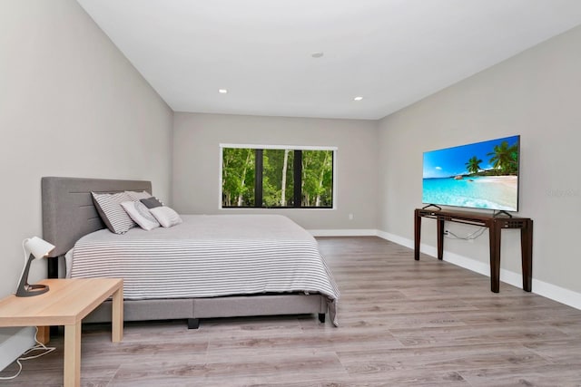 bedroom featuring hardwood / wood-style flooring