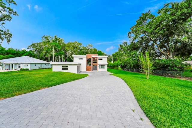 view of front of home with a front yard