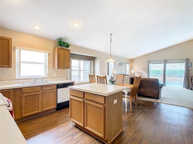 kitchen with sink, plenty of natural light, white dishwasher, and pendant lighting