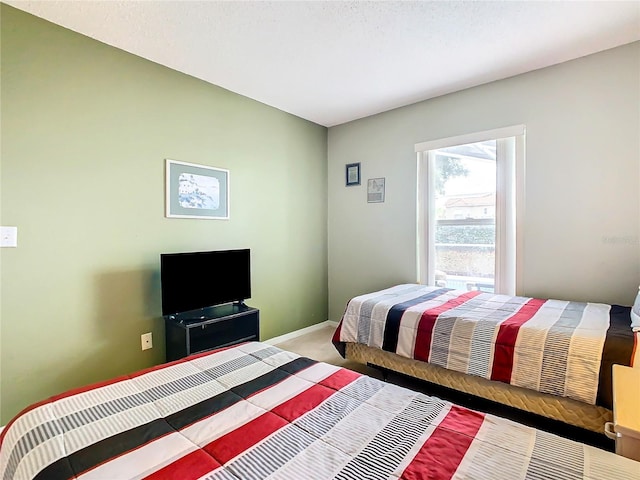 bedroom featuring carpet flooring