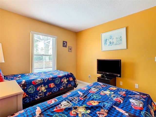 bedroom featuring a textured ceiling