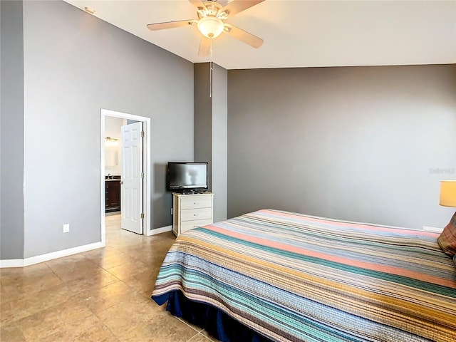 bedroom featuring tile floors, high vaulted ceiling, ensuite bathroom, and ceiling fan