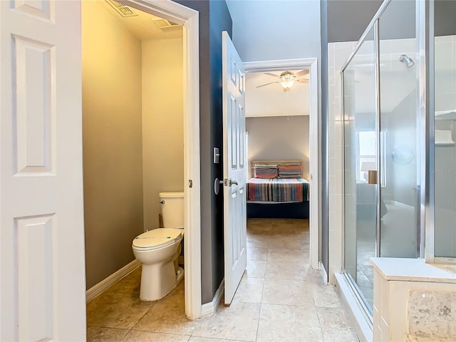 bathroom featuring tile floors, an enclosed shower, ceiling fan, and toilet