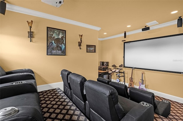 carpeted cinema room featuring ornamental molding