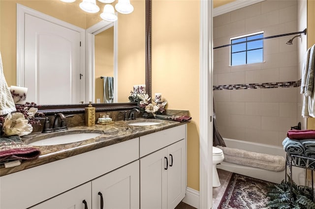 full bathroom featuring tile patterned floors, ornamental molding, vanity, shower / tub combo with curtain, and toilet