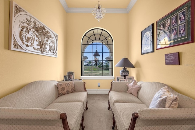 living room with carpet flooring, an inviting chandelier, and ornamental molding