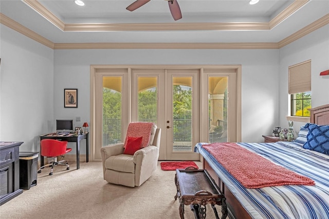 bedroom with carpet flooring, access to exterior, ceiling fan, a raised ceiling, and crown molding