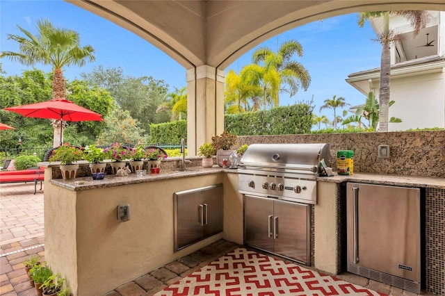 view of patio / terrace featuring area for grilling and grilling area