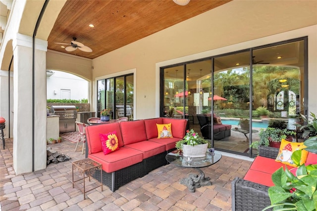 view of patio / terrace with outdoor lounge area, ceiling fan, and area for grilling