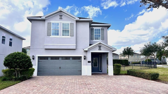 front of property featuring a garage