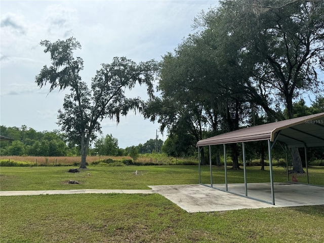 view of yard with a carport