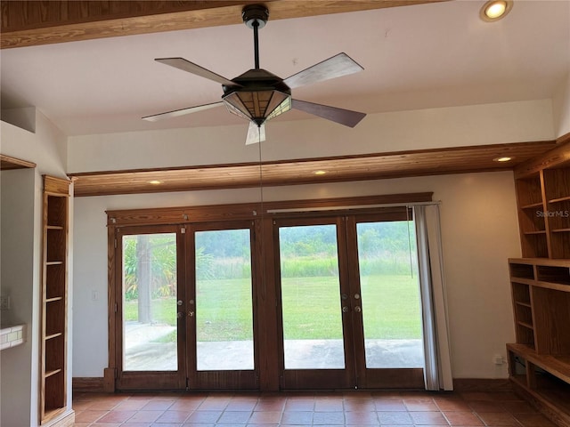 doorway to outside with tile floors, french doors, built in shelves, and ceiling fan