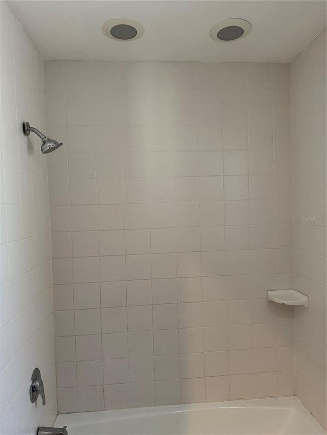 details with tiled shower / bath