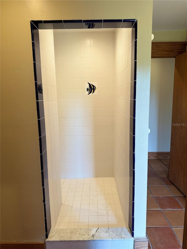 bathroom with tile flooring