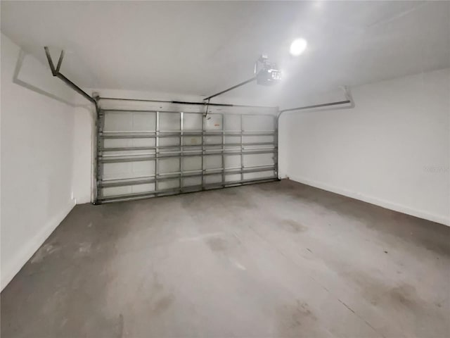 205 Hibiscus St, Winter Haven, FL 33881 - garage featuring a garage door opener