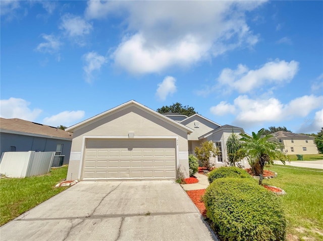 205 Hibiscus St, Winter Haven, FL 33881 - ranch-style home with an attached garage, a front lawn, driveway, and stucco siding