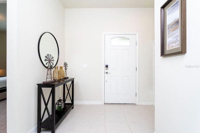 view of tiled foyer entrance