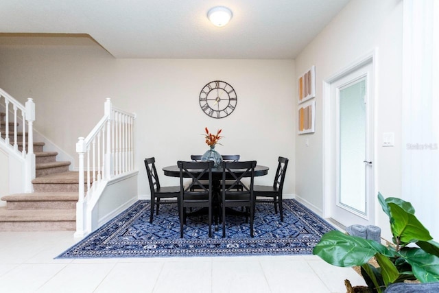 view of tiled dining space