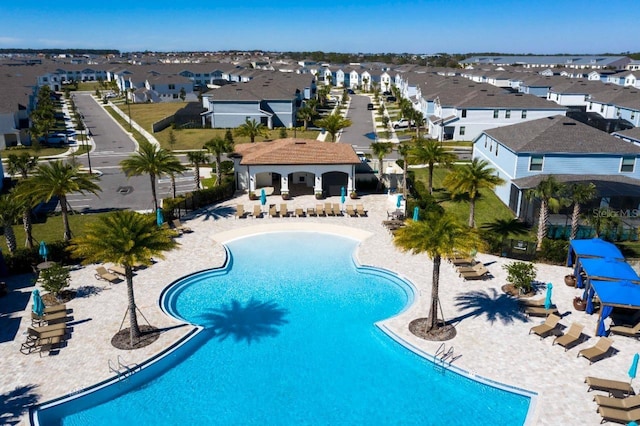 view of swimming pool featuring a patio area