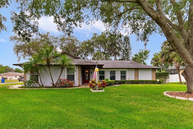 ranch-style house with a front yard