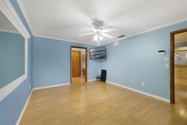 unfurnished bedroom featuring ceiling fan, crown molding, and light hardwood / wood-style flooring