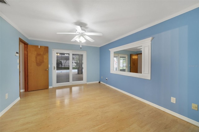 spare room with ceiling fan, light hardwood / wood-style flooring, and ornamental molding