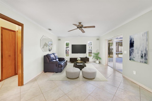 living room featuring ceiling fan, a healthy amount of sunlight, and light tile patterned floors